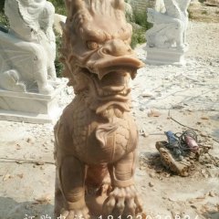 踩球麒麟雕塑，晚霞紅麒麟石雕