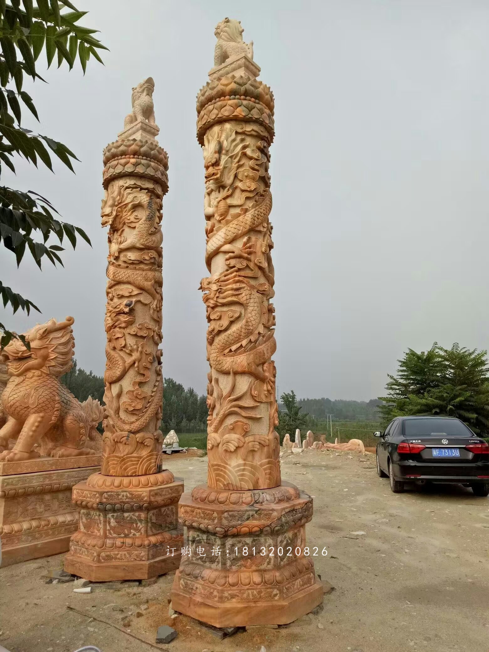 石雕盤龍柱，晚霞紅石龍柱雕塑