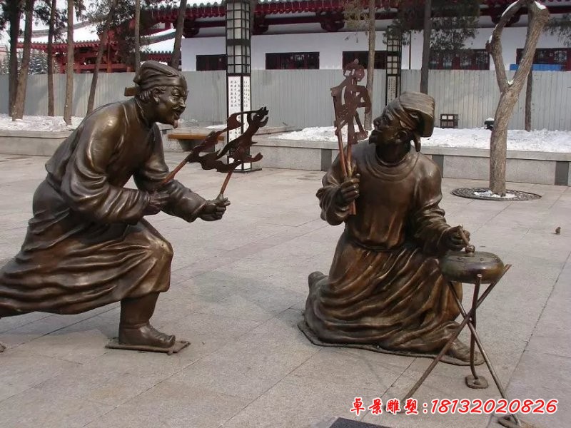 古人唱皮影戲雕塑，玻璃鋼廣場(chǎng)景觀雕塑
